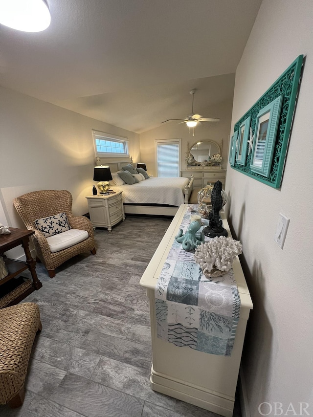 bedroom with lofted ceiling and a ceiling fan