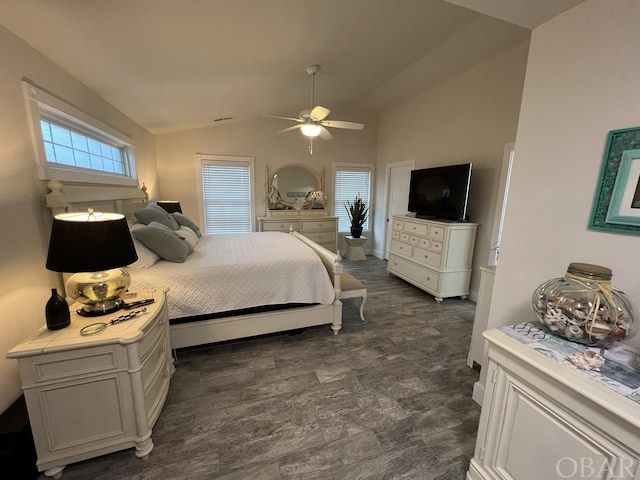 bedroom featuring a ceiling fan and lofted ceiling