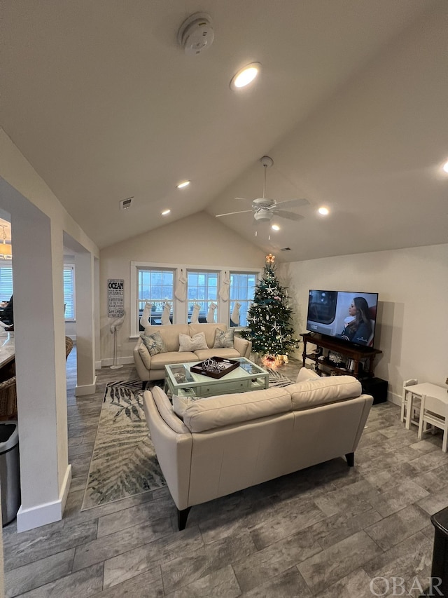 living room with recessed lighting, visible vents, baseboards, vaulted ceiling, and a ceiling fan