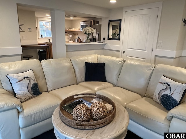 living room with recessed lighting