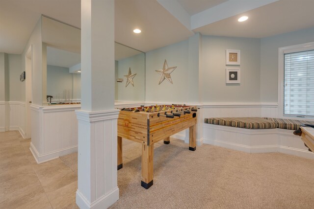 game room with light carpet, a wainscoted wall, and recessed lighting