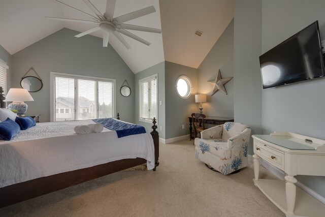 bedroom with visible vents, baseboards, light colored carpet, ceiling fan, and high vaulted ceiling