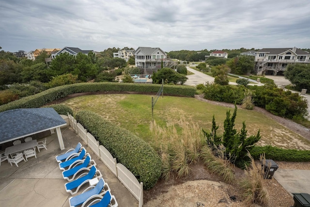 view of home's community featuring a residential view, a lawn, a gazebo, and a patio