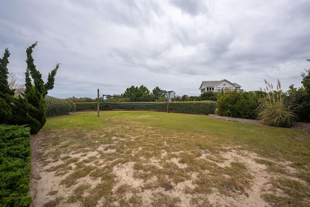 view of yard featuring volleyball court