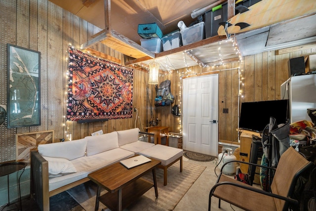 living area featuring wood walls