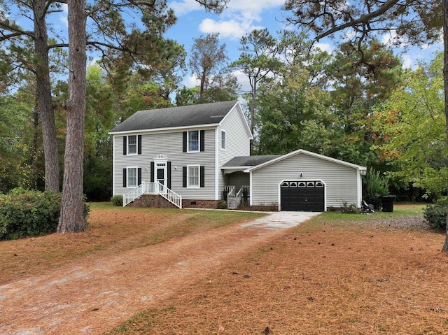 colonial inspired home with crawl space, roof with shingles, an attached garage, and dirt driveway