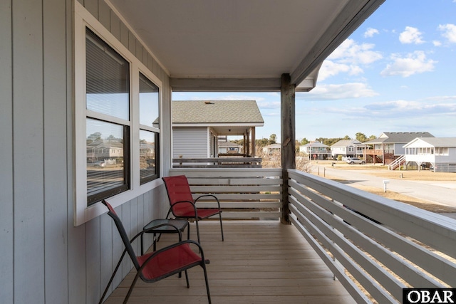 balcony featuring a residential view