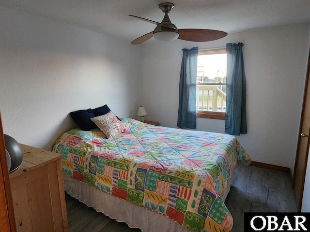 bedroom featuring ceiling fan and wood finished floors