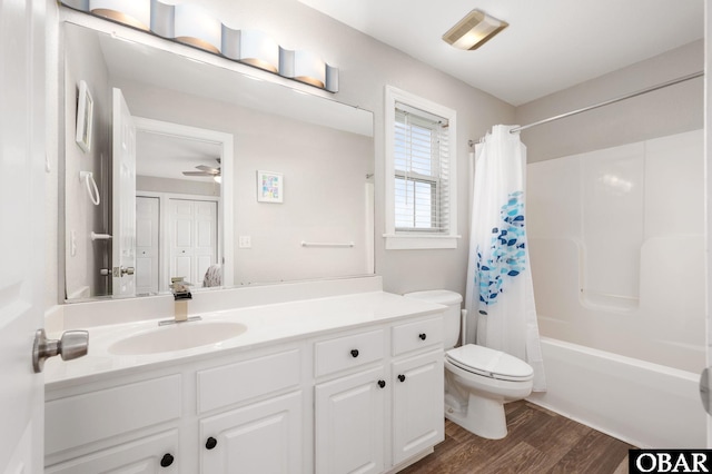 57241 Summerplace Dr Lot 28, Hatteras, NC 27943 - bathroom with toilet, vanity, wood finished floors, shower / bath combo, and a ceiling fan