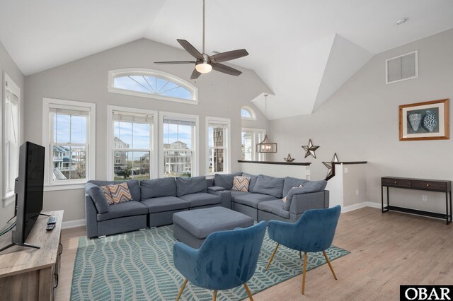 57241 Summerplace Dr Lot 28, Hatteras, NC 27943 - living room featuring ceiling fan, lofted ceiling, plenty of natural light, and light wood-style flooring