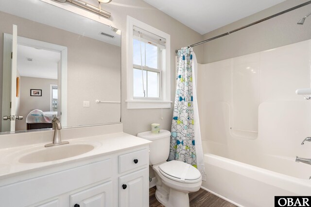 57241 Summerplace Dr Lot 28, Hatteras, NC 27943 - ensuite bathroom with vanity, toilet, shower / bath combo, and wood finished floors