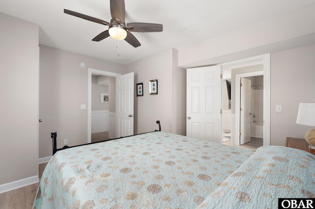 57241 Summerplace Dr Lot 28, Hatteras, NC 27943 - bedroom with wood finished floors, connected bathroom, baseboards, and ceiling fan