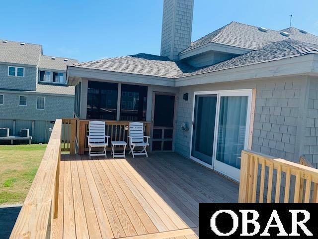 135 Ships Watch Dr Lot 32, Duck, NC 27949 - wooden terrace featuring a sunroom
