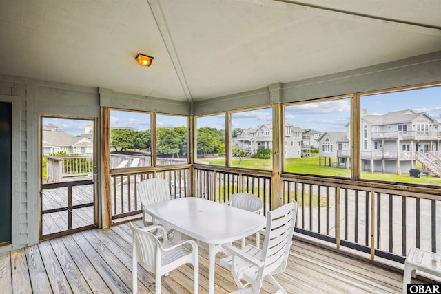 135 Ships Watch Dr Lot 32, Duck, NC 27949 - sunroom with a residential view, healthy amount of natural light, and outdoor dining space