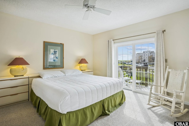 135 Ships Watch Dr Lot 32, Duck, NC 27949 - bedroom featuring light colored carpet, access to outside, a textured ceiling, and a ceiling fan
