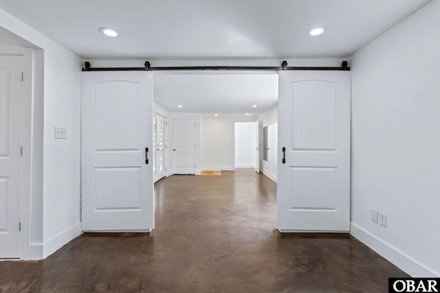 113 B And B Ln, Coinjock, NC 27923 - hall with a barn door, concrete floors, and recessed lighting