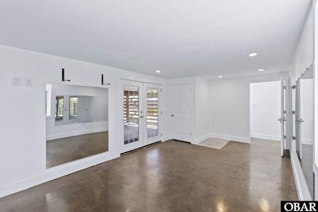 113 B And B Ln, Coinjock, NC 27923 - unfurnished room featuring french doors, finished concrete floors, healthy amount of natural light, and recessed lighting