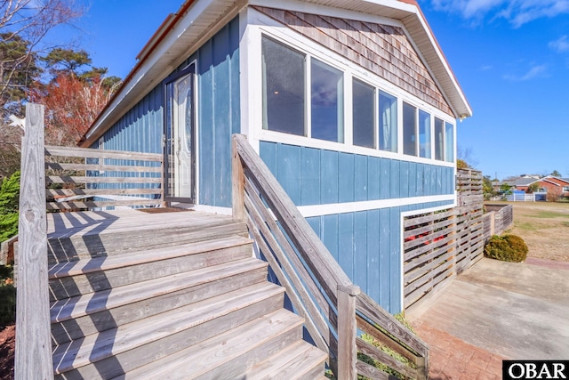113 B And B Ln, Coinjock, NC 27923 - view of home's exterior with a sunroom