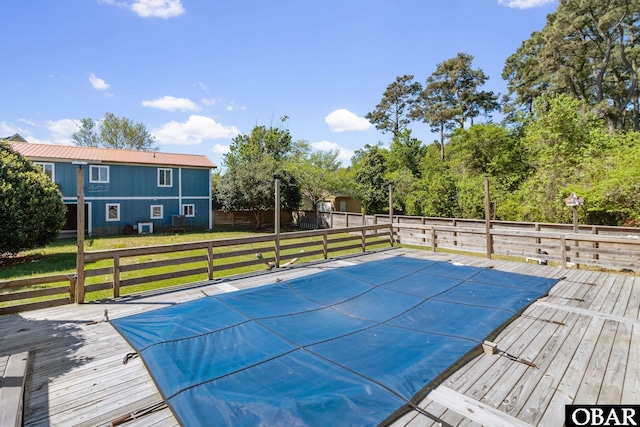 113 B And B Ln, Coinjock, NC 27923 - view of swimming pool featuring a deck and a fenced backyard