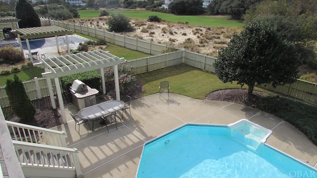 view of swimming pool with a fenced backyard, a patio, a lawn, and a pergola