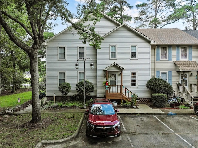 multi unit property with uncovered parking and crawl space