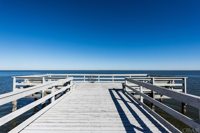 view of dock with a water view