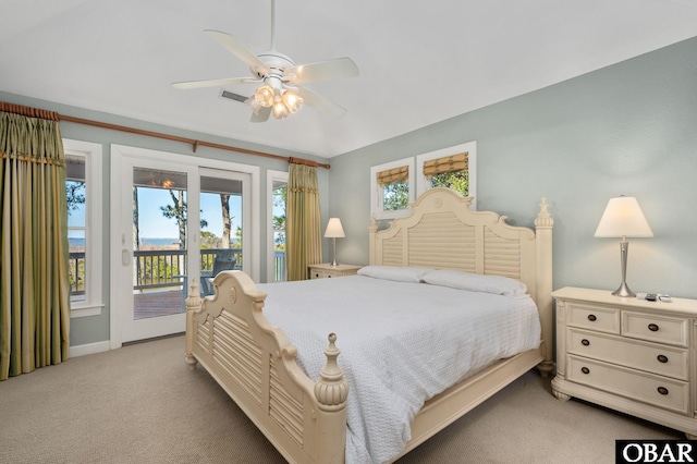 bedroom featuring a ceiling fan, access to outside, light colored carpet, and visible vents