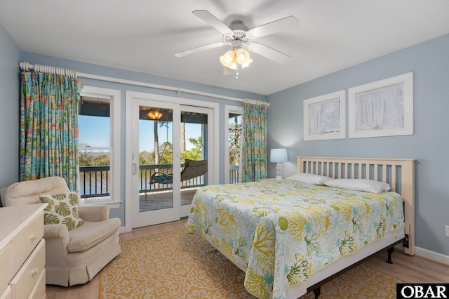 bedroom with baseboards, access to outside, ceiling fan, and light wood-style floors