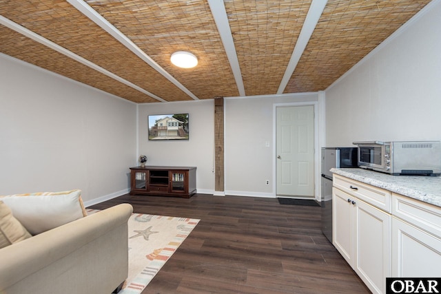 living room with baseboards and dark wood-style flooring