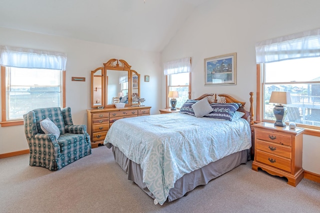 25253 Bold Dune Dr Lot 11, Waves, NC 27968 - bedroom featuring light carpet, multiple windows, baseboards, and high vaulted ceiling