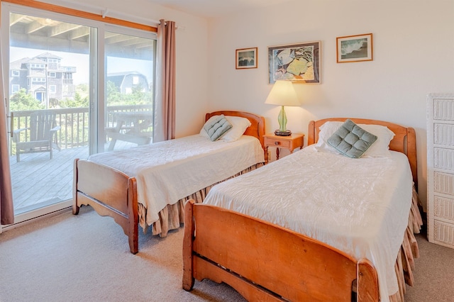 25253 Bold Dune Dr Lot 11, Waves, NC 27968 - bedroom with carpet floors and access to outside