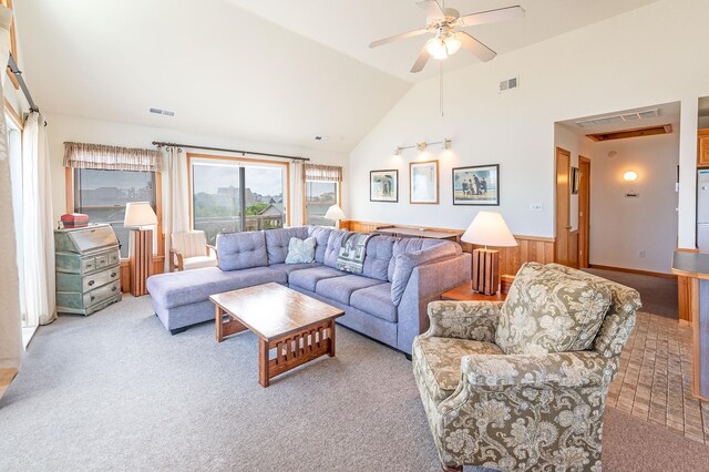 25253 Bold Dune Dr Lot 11, Waves, NC 27968 - living area featuring healthy amount of natural light, carpet, a wainscoted wall, vaulted ceiling, and ceiling fan