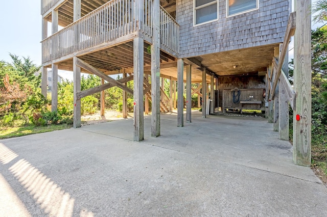 25253 Bold Dune Dr Lot 11, Waves, NC 27968 - view of patio featuring driveway and a carport