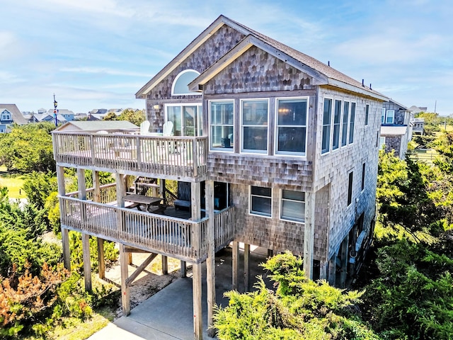 25253 Bold Dune Dr Lot 11, Waves, NC 27968 - rear view of house featuring a deck and a carport