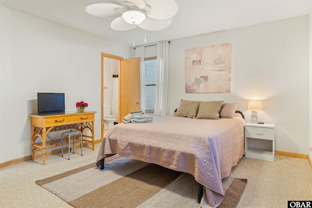 1039 Miller Ct Lot 526, Corolla, NC 27927 - carpeted bedroom featuring baseboards, ceiling fan, and connected bathroom