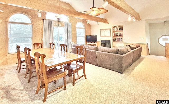 1039 Miller Ct Lot 526, Corolla, NC 27927 - dining area featuring wooden walls, light colored carpet, ceiling fan, rail lighting, and built in features