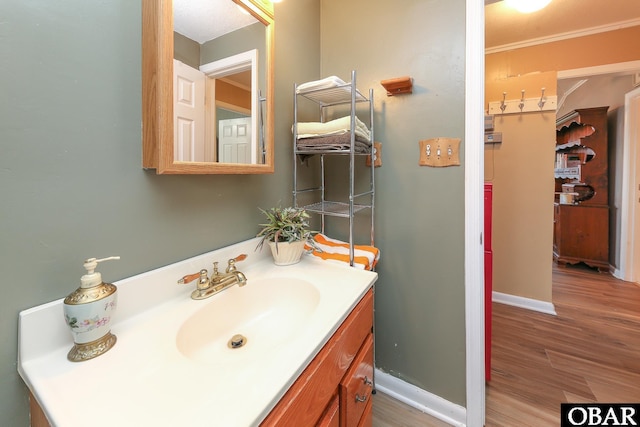 156 Longbeach Dr Unit Lot3, Hertford, NC 27944 - bathroom featuring wood finished floors, vanity, and crown molding