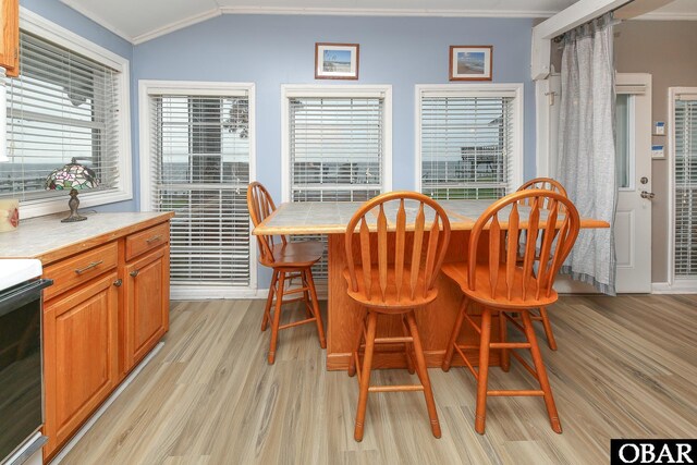 156 Longbeach Dr Unit Lot3, Hertford, NC 27944 - dining room featuring ornamental molding, light wood finished floors, plenty of natural light, and vaulted ceiling