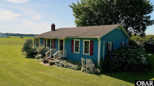 2253 Turnpike Rd, Swan Quarter, NC 27885 - view of front of property featuring a chimney and a front yard