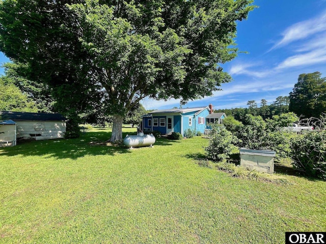 2253 Turnpike Rd, Swan Quarter, NC 27885 - view of green lawn featuring an outbuilding