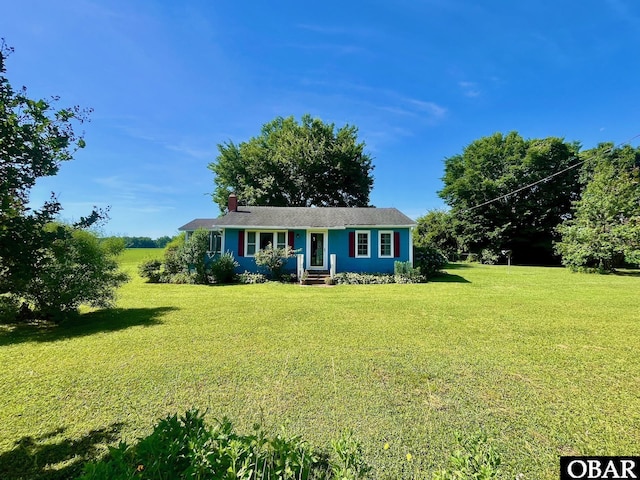 2253 Turnpike Rd, Swan Quarter, NC 27885 - ranch-style home with a front lawn and a chimney