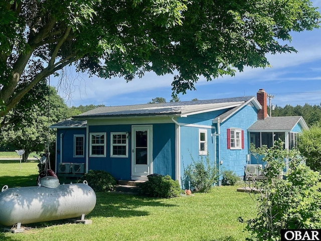 2253 Turnpike Rd, Swan Quarter, NC 27885 - rear view of property with a yard