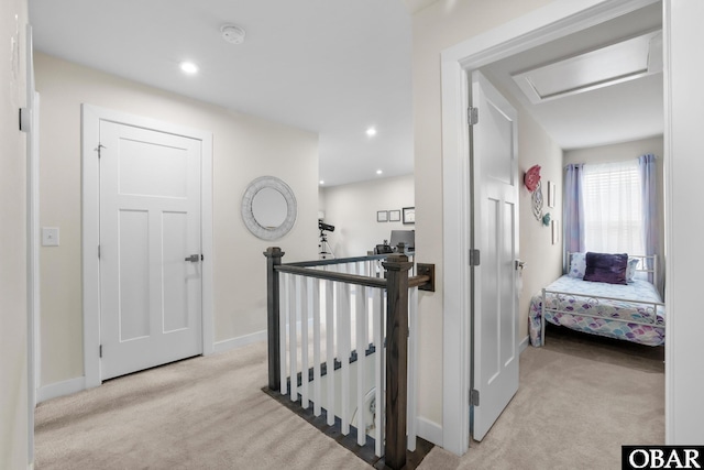 129 Glenmoor Path Lot 35, Moyock, NC 27958 - hallway with carpet, an upstairs landing, attic access, baseboards, and recessed lighting