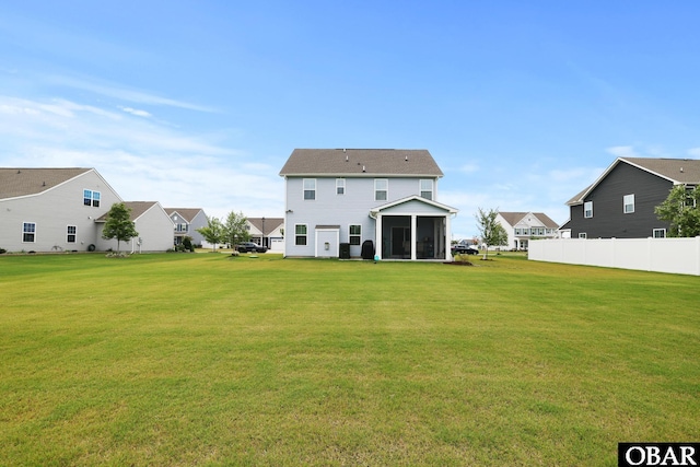 129 Glenmoor Path Lot 35, Moyock, NC 27958 - rear view of house with a sunroom and a residential view