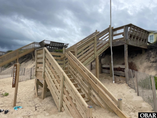 114 Poteskeet Dr Lot 66, Kitty Hawk, NC 27949 - view of jungle gym featuring stairway and fence