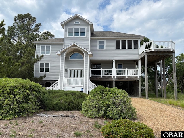 114 Poteskeet Dr Lot 66, Kitty Hawk, NC 27949 - rear view of property with a deck and roof with shingles