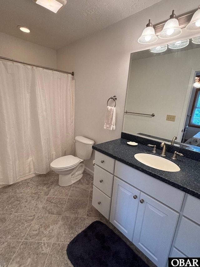 114 Poteskeet Dr Lot 66, Kitty Hawk, NC 27949 - bathroom featuring vanity, toilet, a shower with curtain, and a textured ceiling