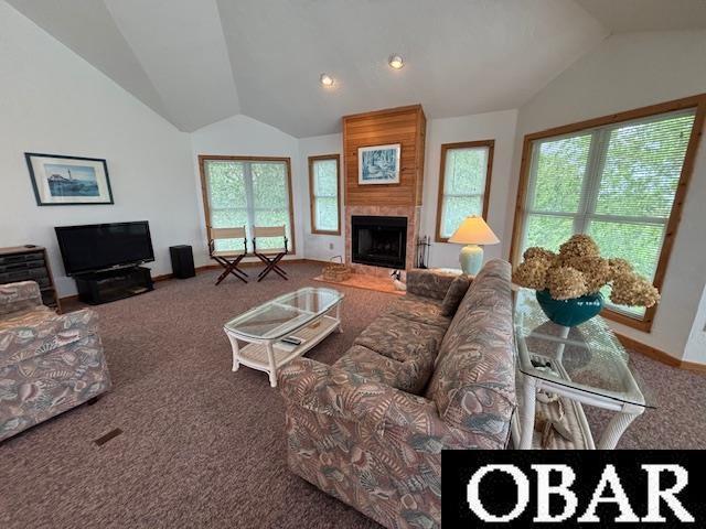 114 Poteskeet Dr Lot 66, Kitty Hawk, NC 27949 - living room with vaulted ceiling, carpet, plenty of natural light, and baseboards