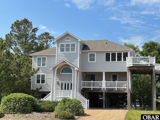 114 Poteskeet Dr Lot 66, Kitty Hawk, NC 27949 - rear view of property with roof with shingles