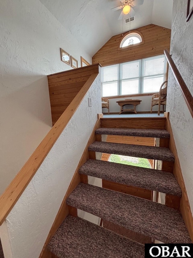 114 Poteskeet Dr Lot 66, Kitty Hawk, NC 27949 - staircase featuring a textured wall, lofted ceiling, and a ceiling fan